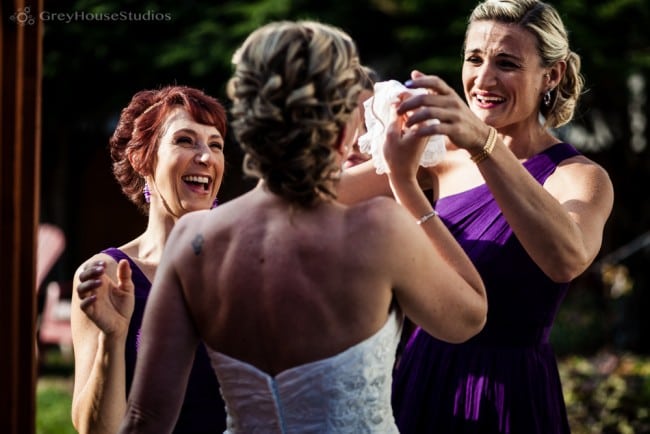 bride sees groom for first look and cries photo