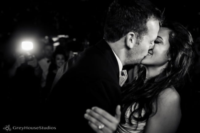winvian wedding reception bride groom kissing after cutting cake photos